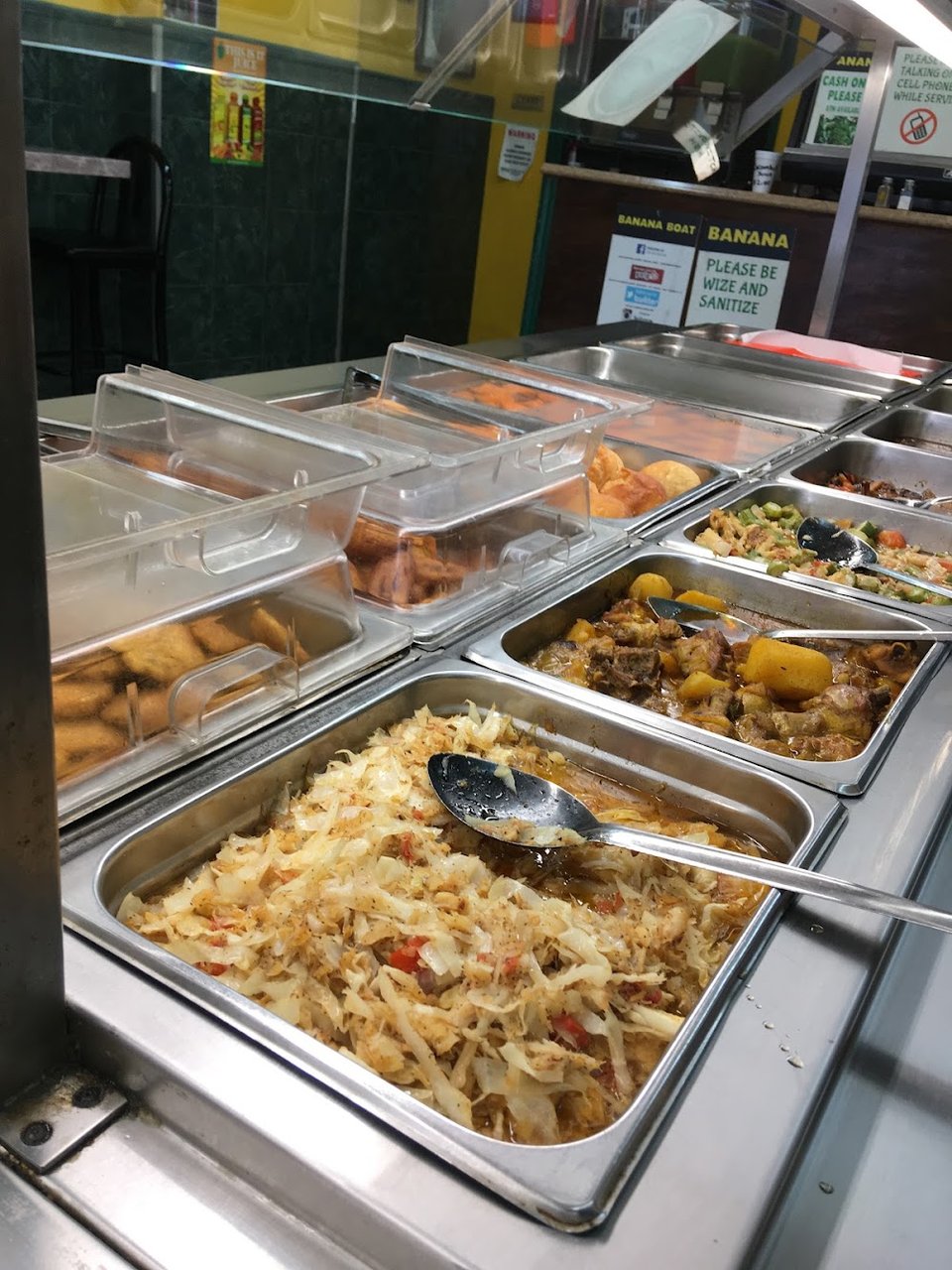 Printed menu with Caribbean breakfast and combo plates.