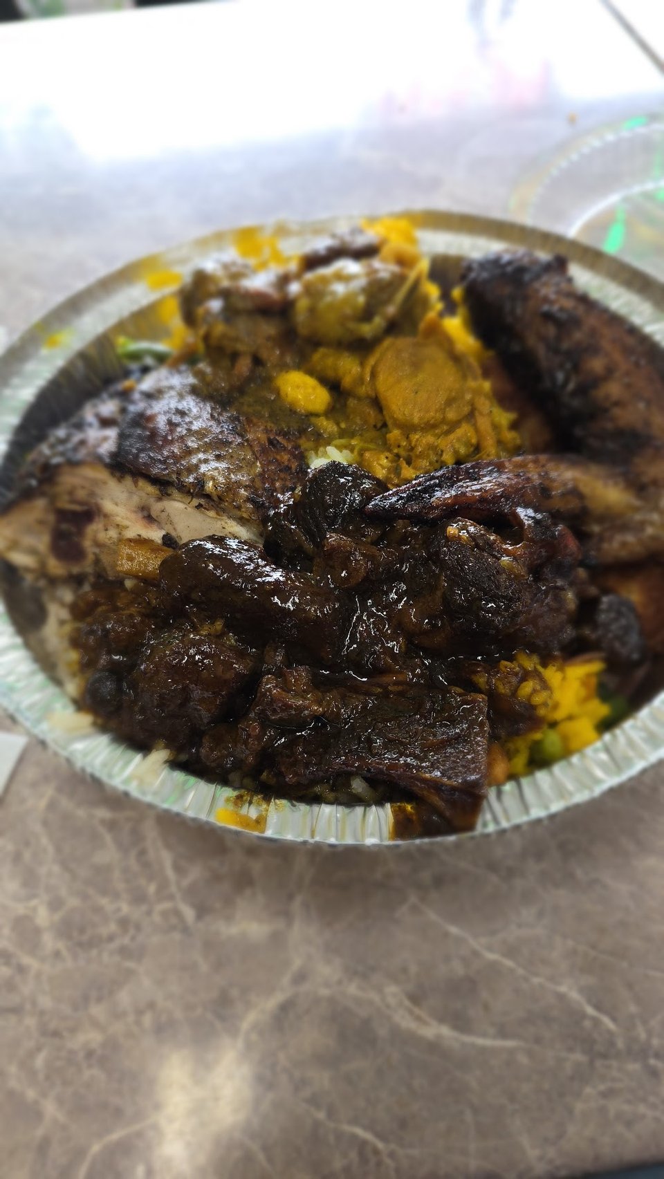 Printed menu with Caribbean breakfast and combo plates.